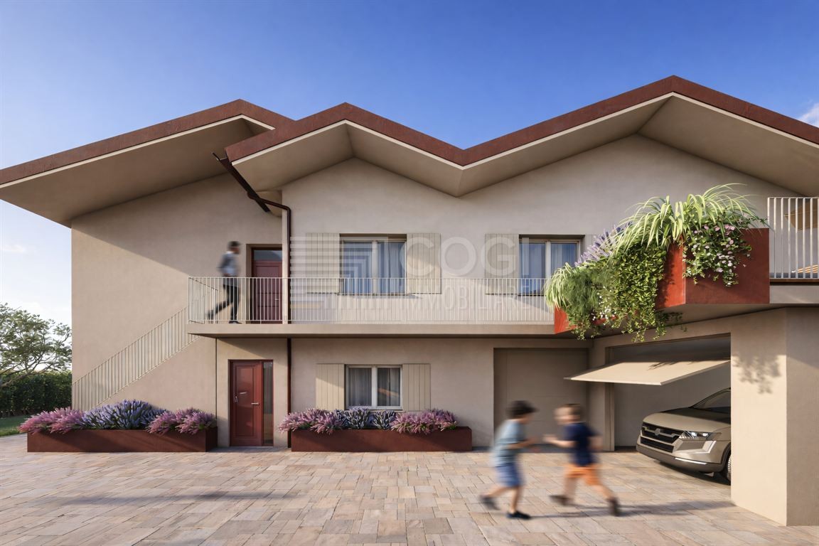 Porzione di bifamiliare con ampi spazi e rendering di ristrutturazione